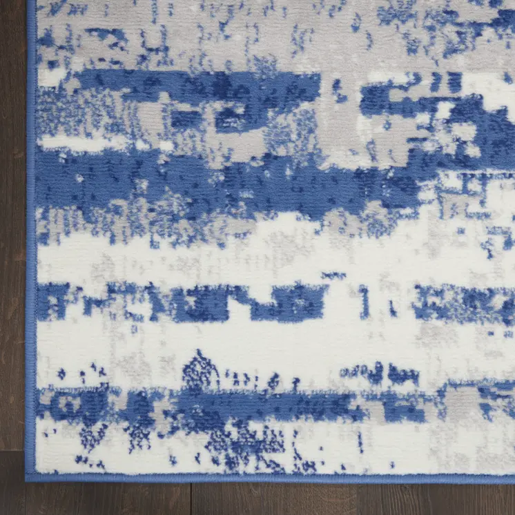 2' X 3' Ivory And Navy Blue Abstract Area Rug