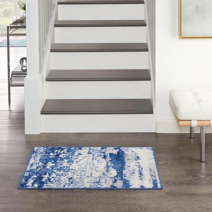 2' X 3' Ivory And Navy Blue Abstract Area Rug