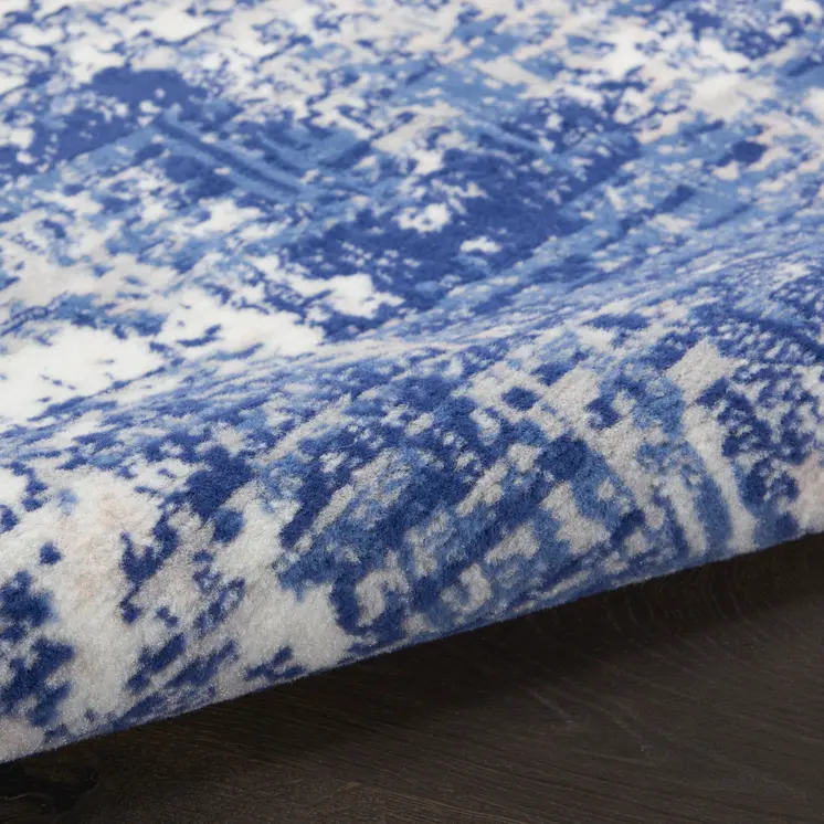 5' Ivory and Blue Abstract Distressed Round Rug