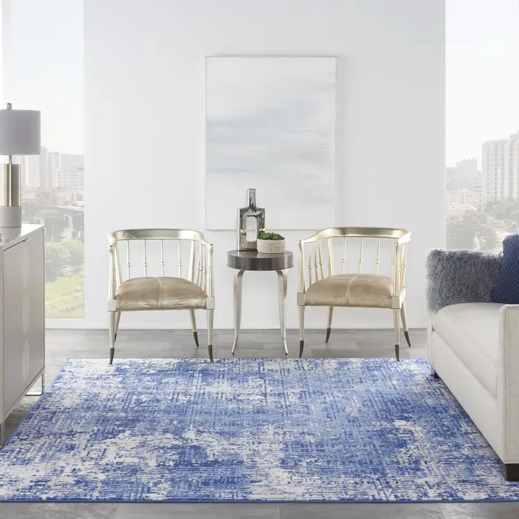 7' X 10' Ivory and Blue Abstract Distressed Area Rug