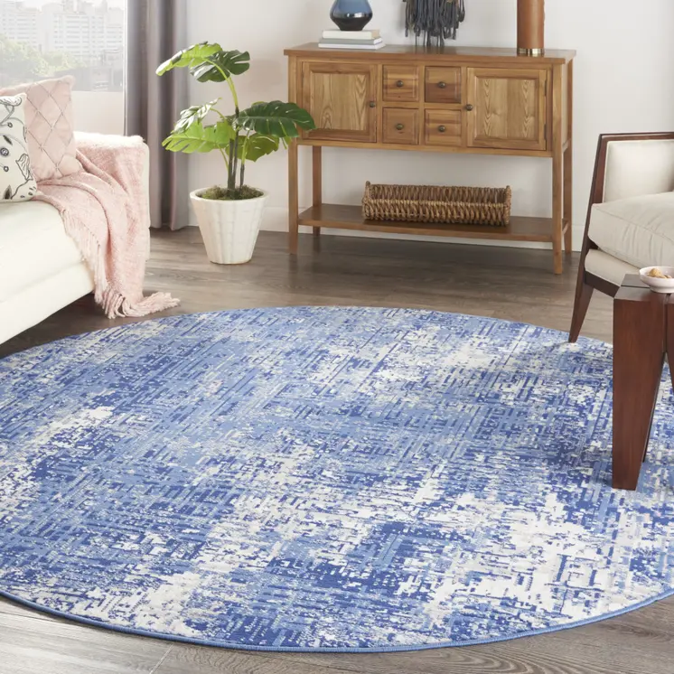 8' Ivory and Blue Abstract Distressed Round Rug