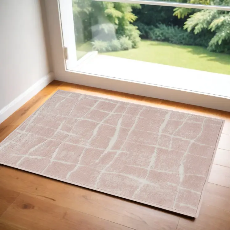 2' X 3' Pink and Ivory Abstract Area Rug