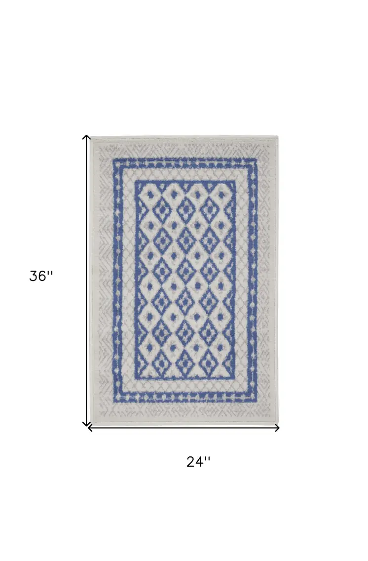 2' X 3' Ivory and Blue Geometric Distressed Area Rug