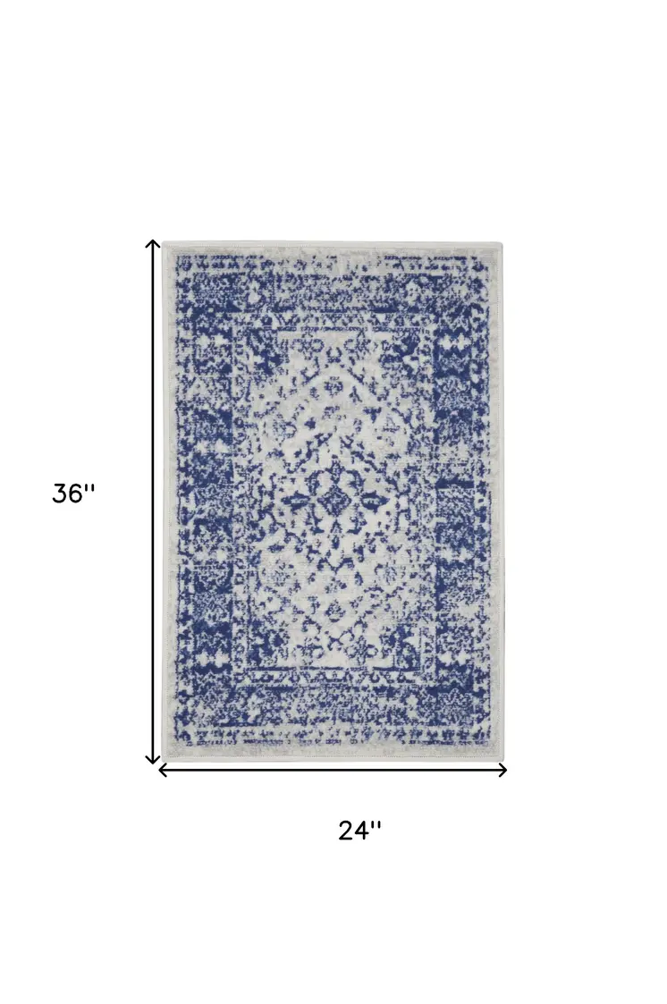2' X 3' Ivory and Navy Blue Geometric Distressed Area Rug