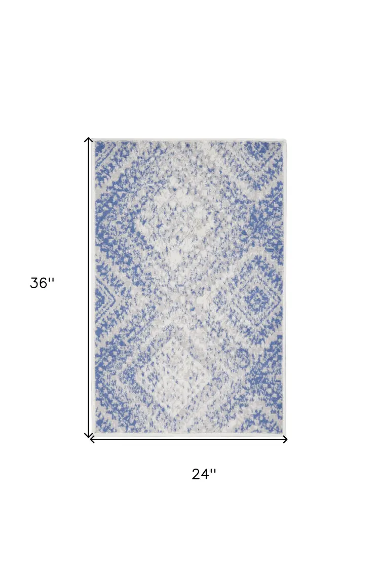 2' X 3' Ivory and Blue Geometric Distressed Area Rug