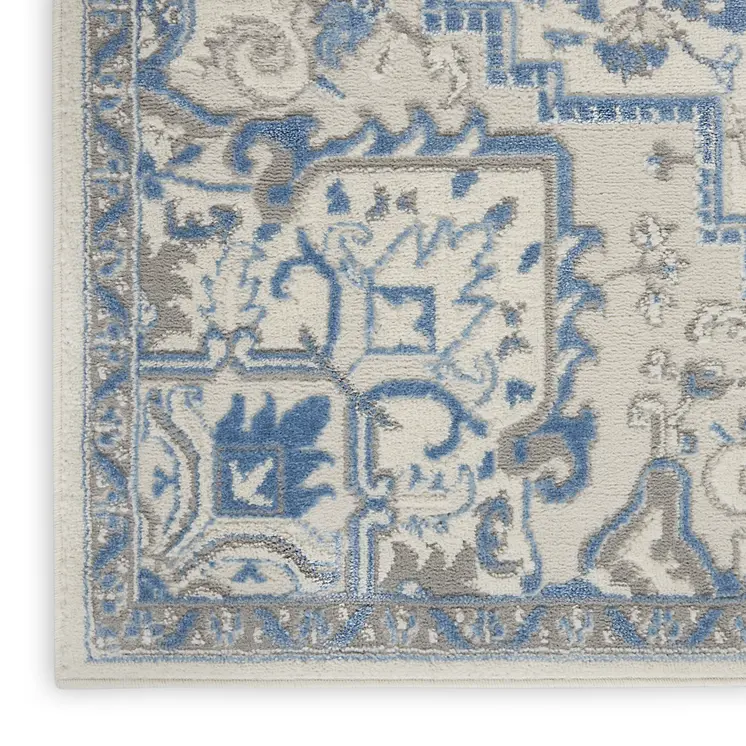 5' X 7' Blue Floral Power Loom Area Rug