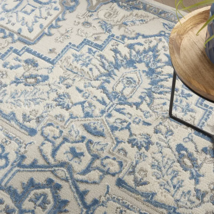 5' X 7' Blue Floral Power Loom Area Rug