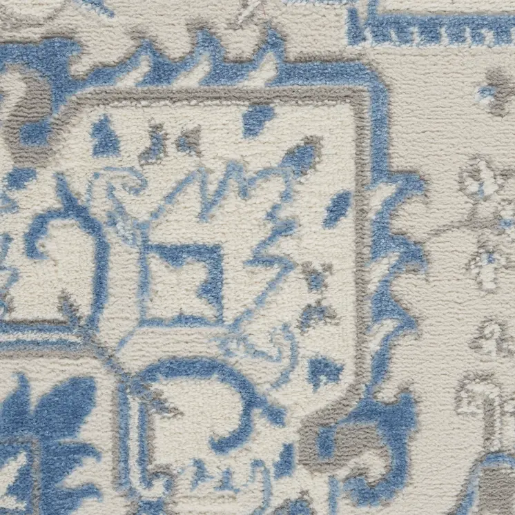 5' X 7' Blue Floral Power Loom Area Rug