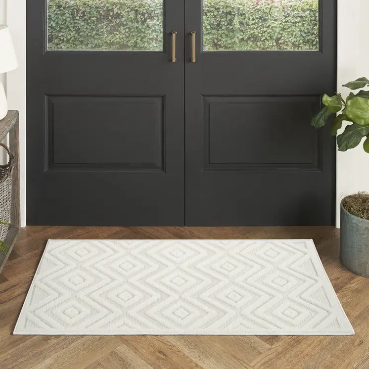 3' X 5' Ivory And White Geometric Indoor Outdoor Area Rug