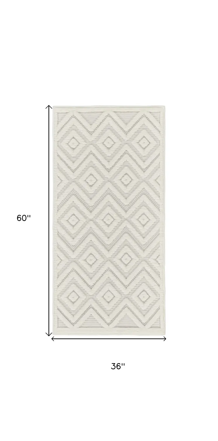 3' X 5' Ivory And White Geometric Indoor Outdoor Area Rug