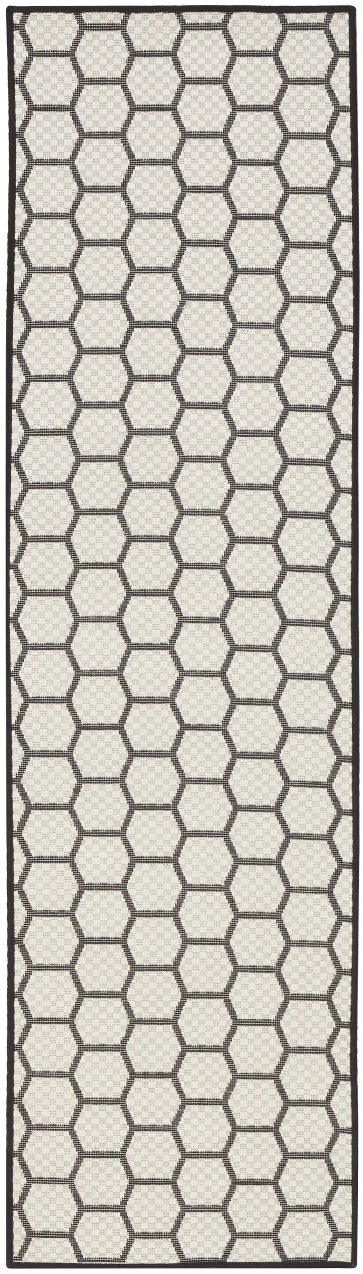 6' Black And Ivory Geometric Indoor Outdoor Area Rug
