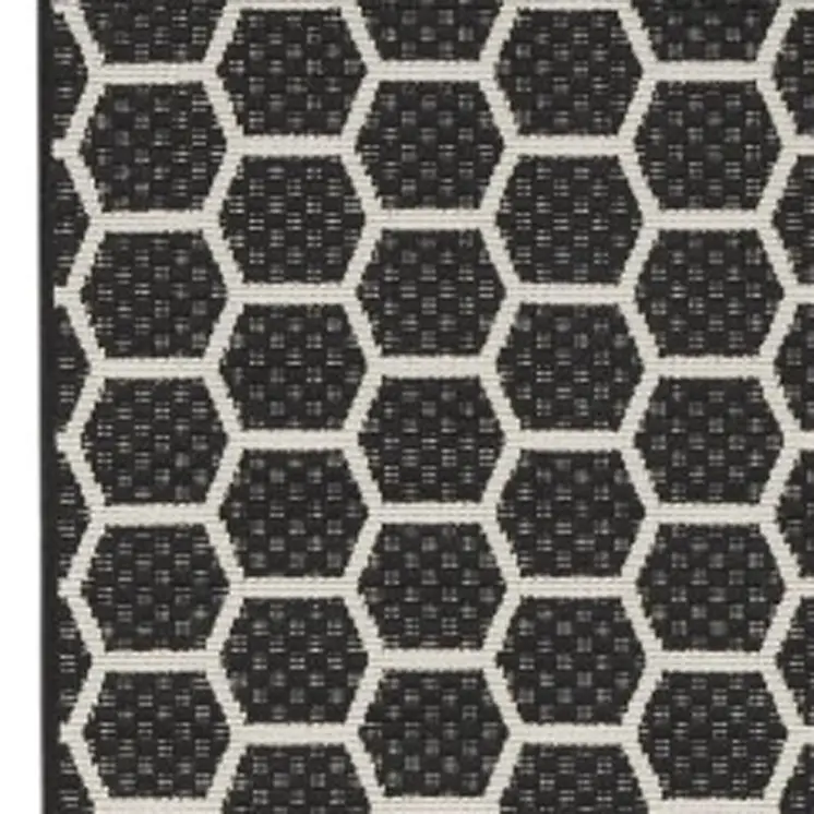 6' Black And Ivory Geometric Indoor Outdoor Area Rug