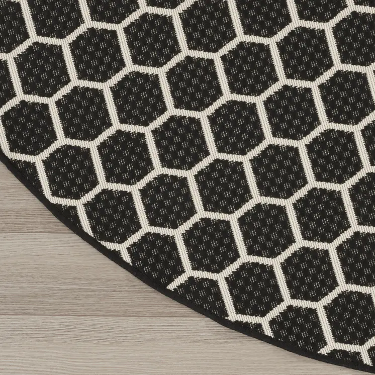 8' Black And Ivory Geometric Indoor Outdoor Area Rug