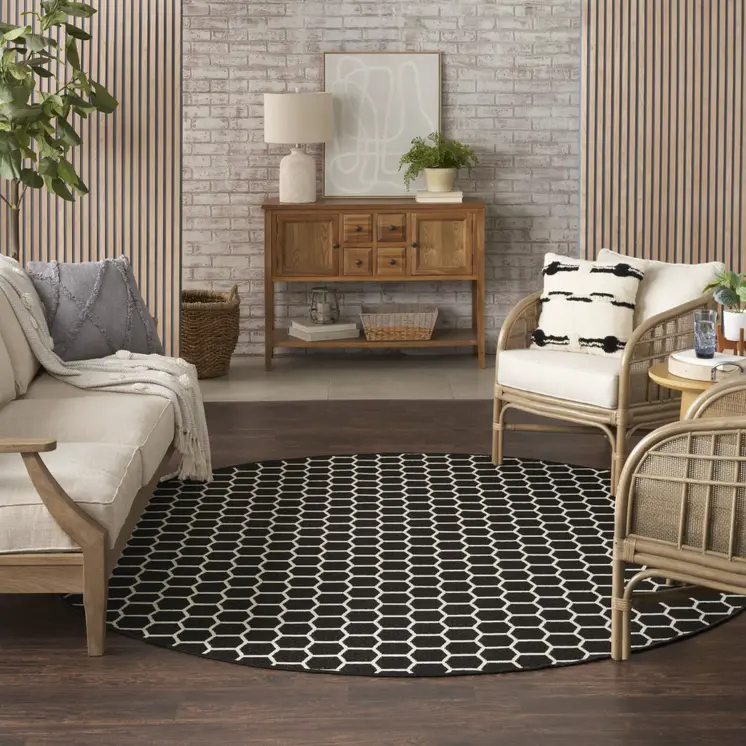 8' Black And Ivory Geometric Indoor Outdoor Area Rug
