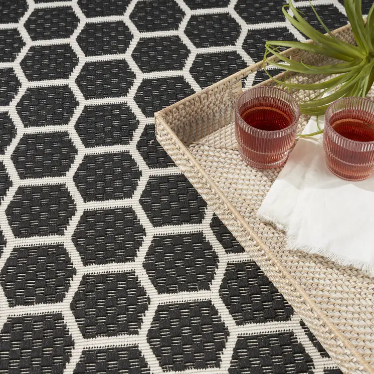 9' X 12' Black And Ivory Geometric Indoor Outdoor Area Rug