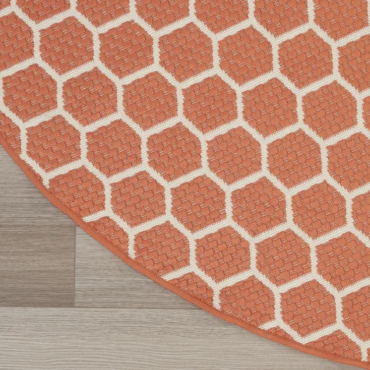 8' Coral And Ivory Geometric Indoor Outdoor Area Rug