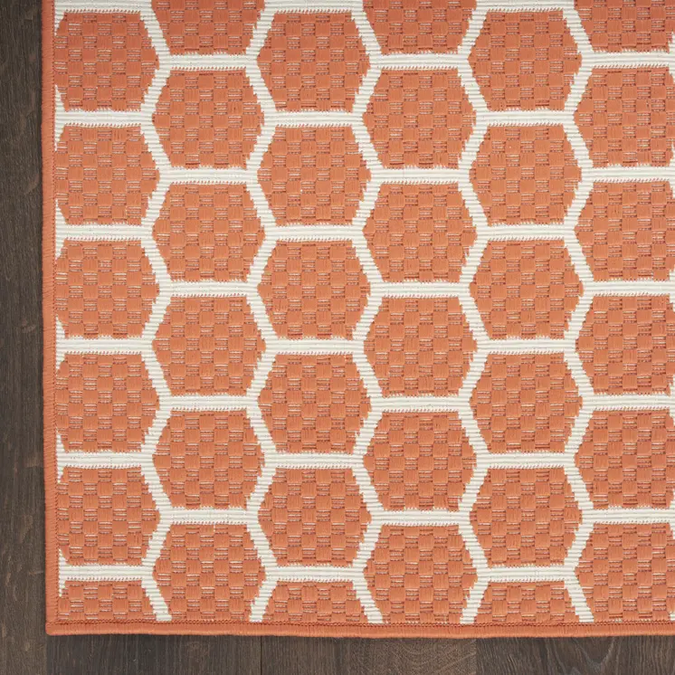 8' X 10' Coral And Ivory Geometric Indoor Outdoor Area Rug