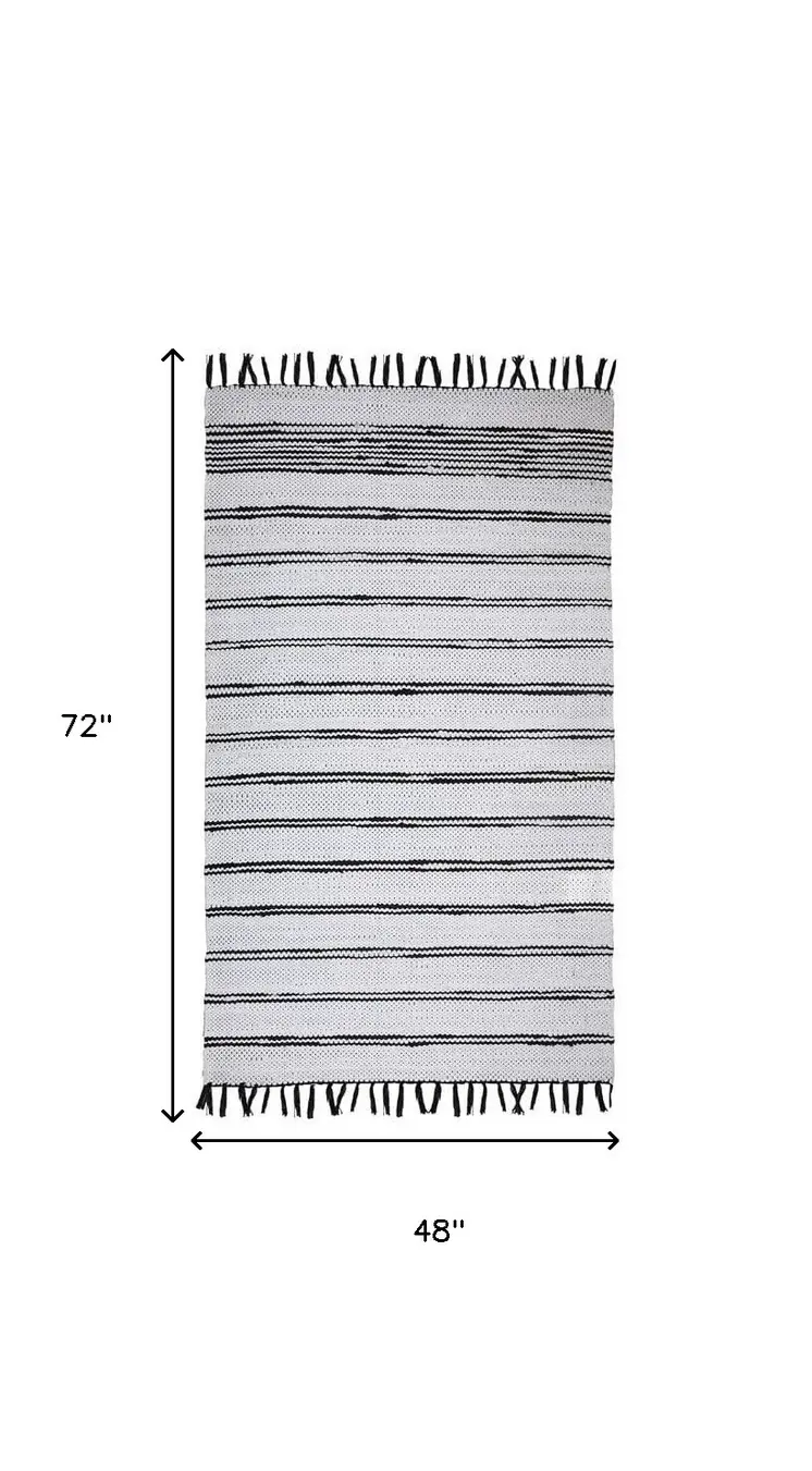 4' X 6' Black And White Striped Hand Woven Washable Area Rug With Fringe