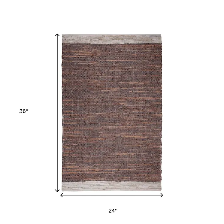2' X 3' Tan Black and Beige Patchwork Handmade Indoor Outdoor Area Rug