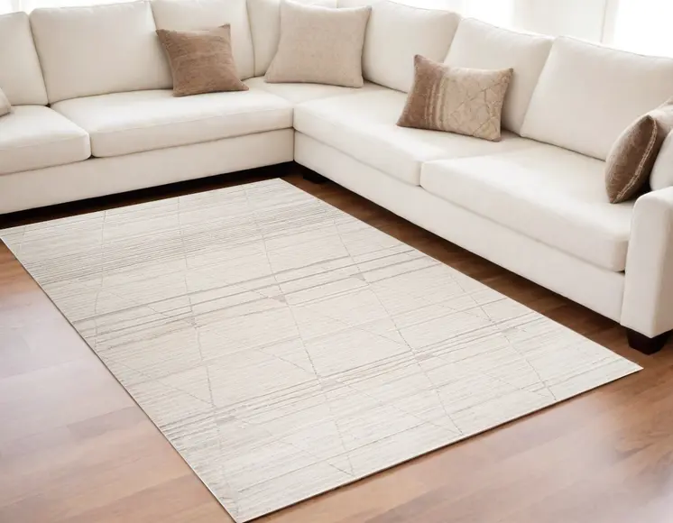 5' X 8' Cream and Beige Abstract Area Rug