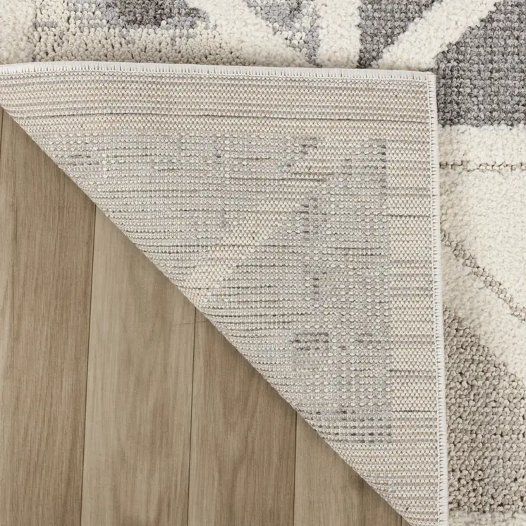 8' Gray And Cream Geometric Distressed Runner Rug