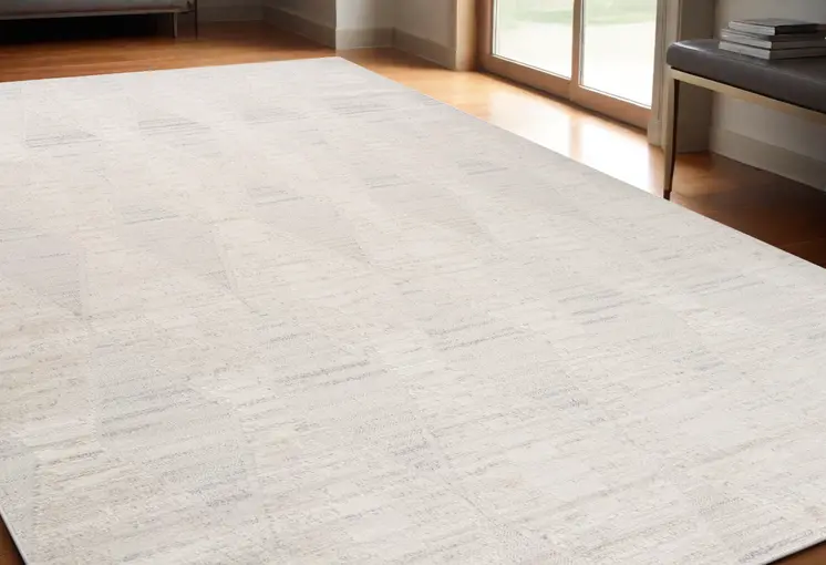 5' X 8' Cream and Beige Geometric Distressed Area Rug
