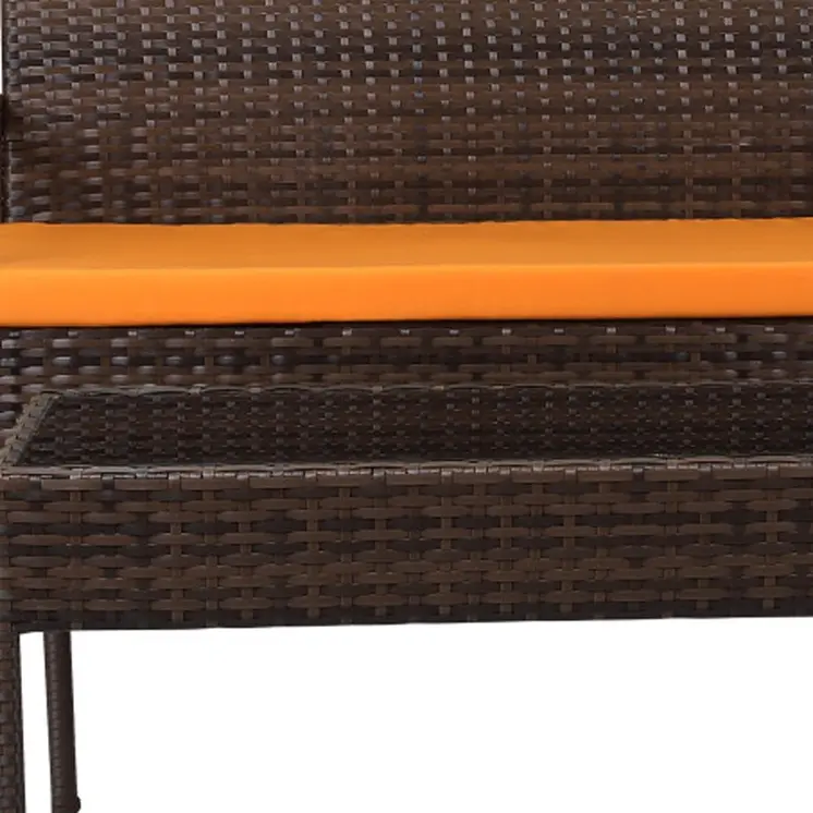 Four Piece Outdoor Dark Brown Wicker Sofa Seating Group with Orange Cushions