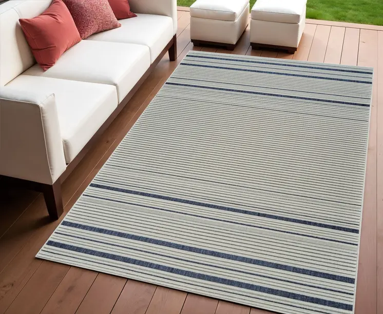 4' X 6' Blue and Cream Striped Distressed Indoor Outdoor Area Rug
