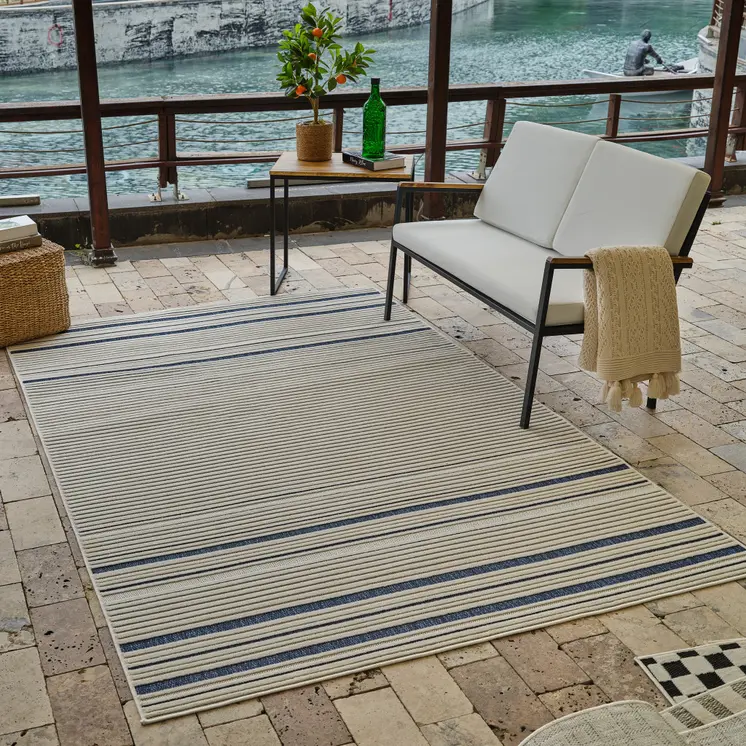 4' X 6' Blue and Cream Striped Distressed Indoor Outdoor Area Rug