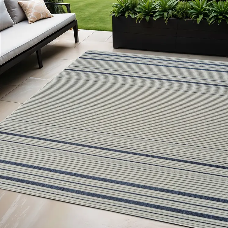 5' X 7' Blue and Cream Striped Distressed Indoor Outdoor Area Rug