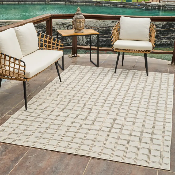 5' X 7' Cream and Beige Geometric Distressed Indoor Outdoor Area Rug