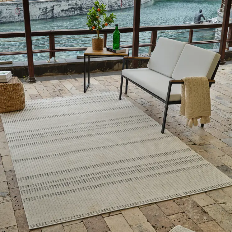 4' X 6' Cream and Beige Striped Distressed Indoor Outdoor Area Rug