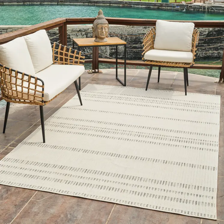 5' X 7' Cream and Beige Striped Distressed Indoor Outdoor Area Rug