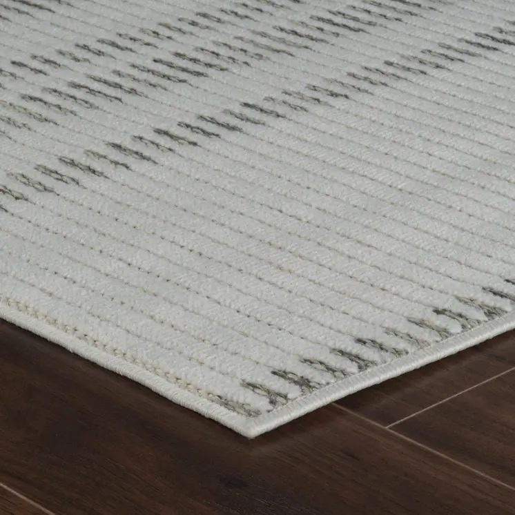 5' X 7' Cream and Beige Striped Distressed Indoor Outdoor Area Rug