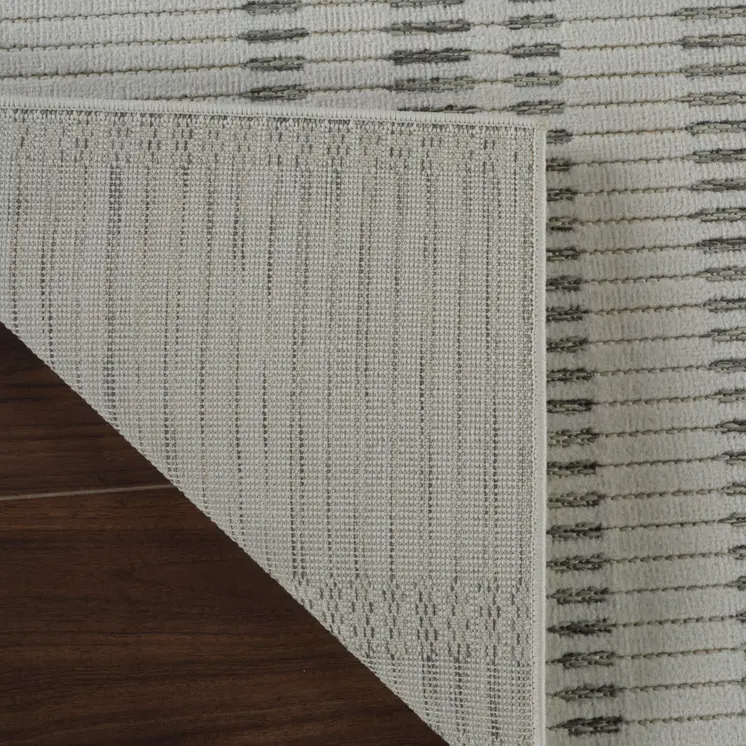 6' X 9' Cream and Beige Striped Distressed Indoor Outdoor Area Rug
