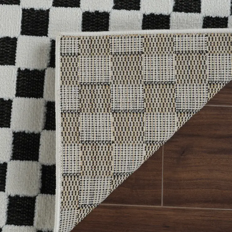 8' Black and White Geometric Distressed Indoor Outdoor Runner Rug