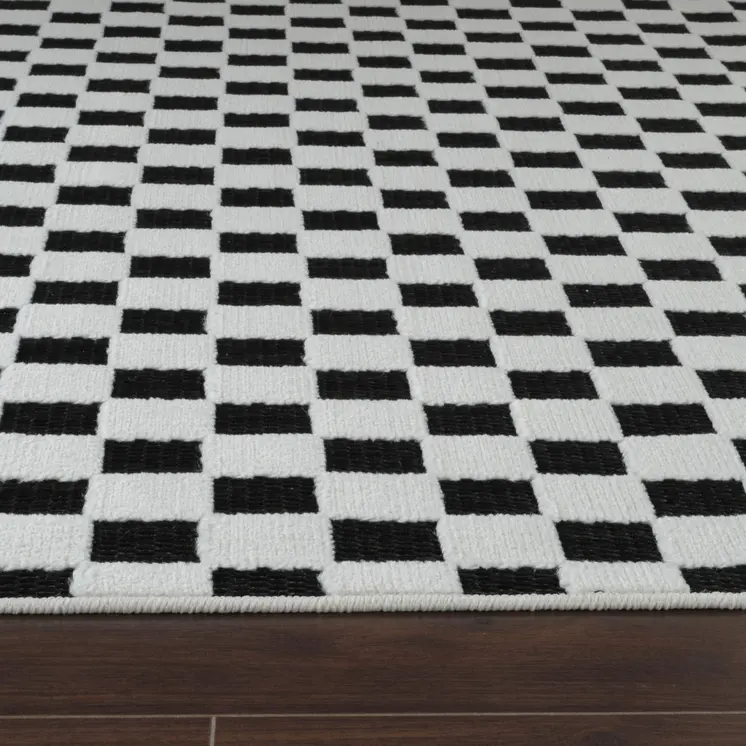 8' Black and White Geometric Distressed Indoor Outdoor Runner Rug