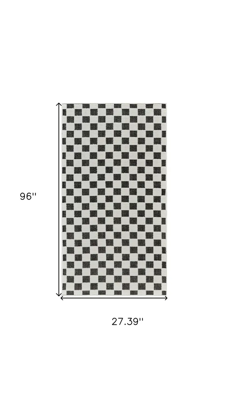 8' Black and White Geometric Distressed Indoor Outdoor Runner Rug