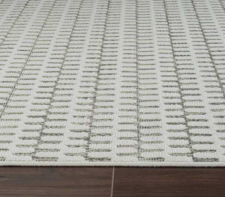 5' X 7' Cream and Beige Geometric Distressed Indoor Outdoor Area Rug