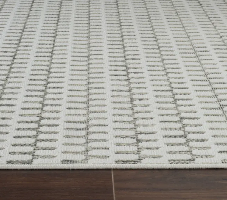 5' X 7' Cream and Beige Geometric Distressed Indoor Outdoor Area Rug