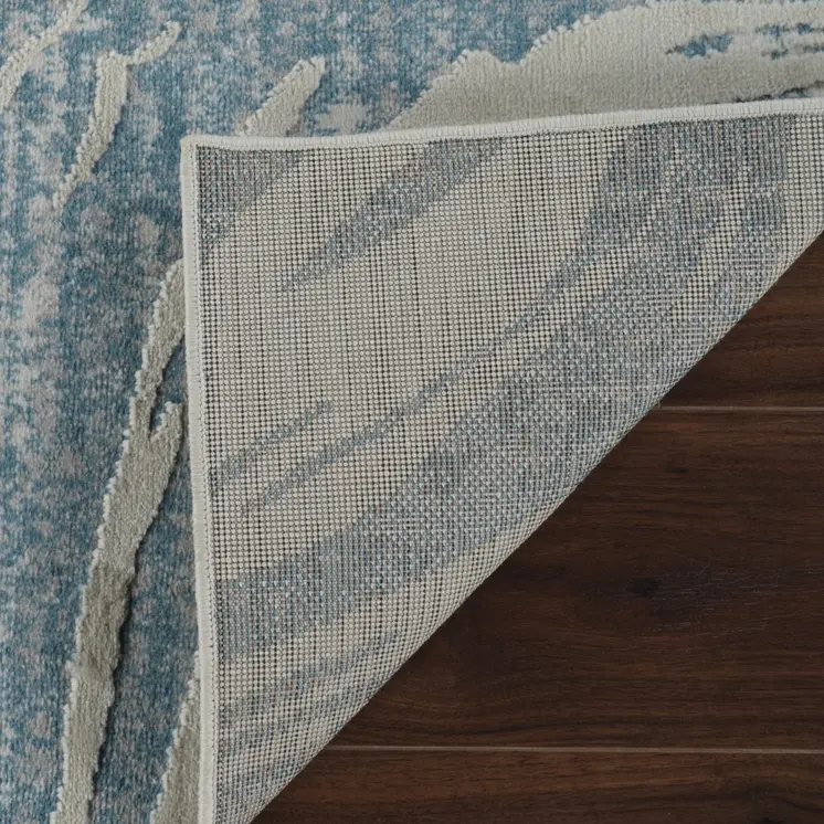 5' X 8' Blue and Beige Abstract Distressed Area Rug