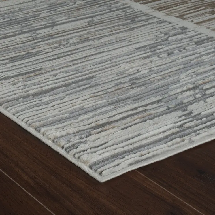 4' X 6' Beige and Brown Abstract Distressed Area Rug