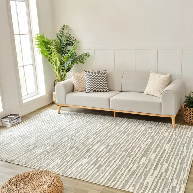 5' X 8' Beige and Green Abstract Distressed Area Rug