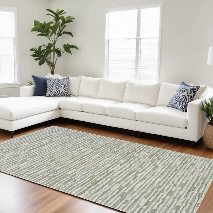 7' X 10' Beige and Green Abstract Distressed Area Rug