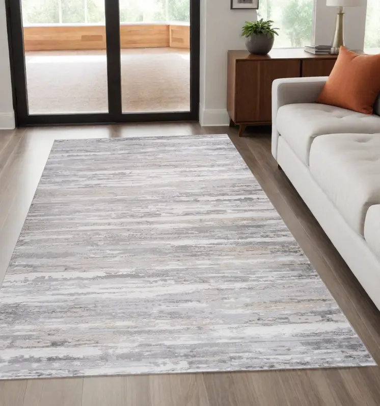 5' X 8' Beige and Gray Abstract Worn Faded Area Rug