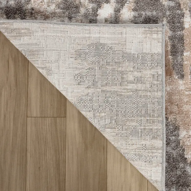 5' X 8' Beige and Brown Abstract Distressed Area Rug