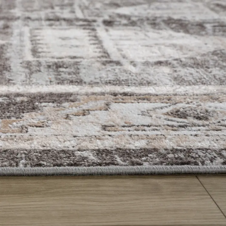 5' X 8' Beige and Brown Abstract Distressed Area Rug