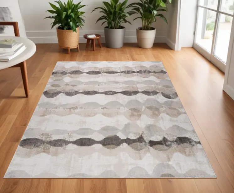 4' X 6' Beige and Brown Abstract Distressed Area Rug
