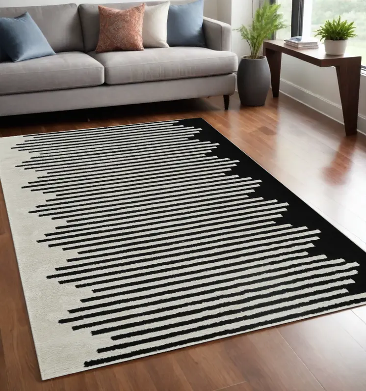 5' X 8' Cream and Black Abstract Worn Faded Area Rug