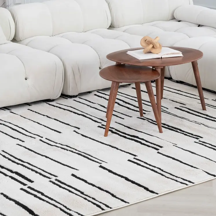 4' X 6' Cream and Black Abstract Distressed Area Rug